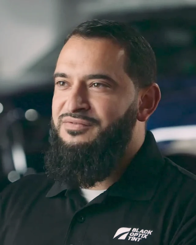 Mohamed Mustafa, Black Optix Tint franchise owner, in the shop